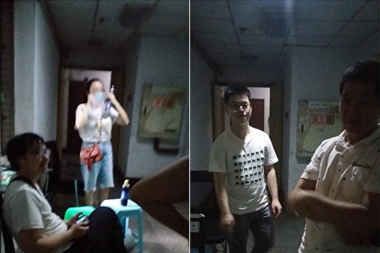 重庆市渝中区街道人员派来监控郮开惠的工作人员。.jpg 重庆市渝中区街道人员派来监控郮开惠的工作人员。.jpg